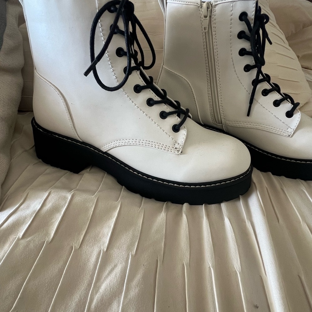 NWOT never worn.Madden Girl White Combat Boots with Black Sole